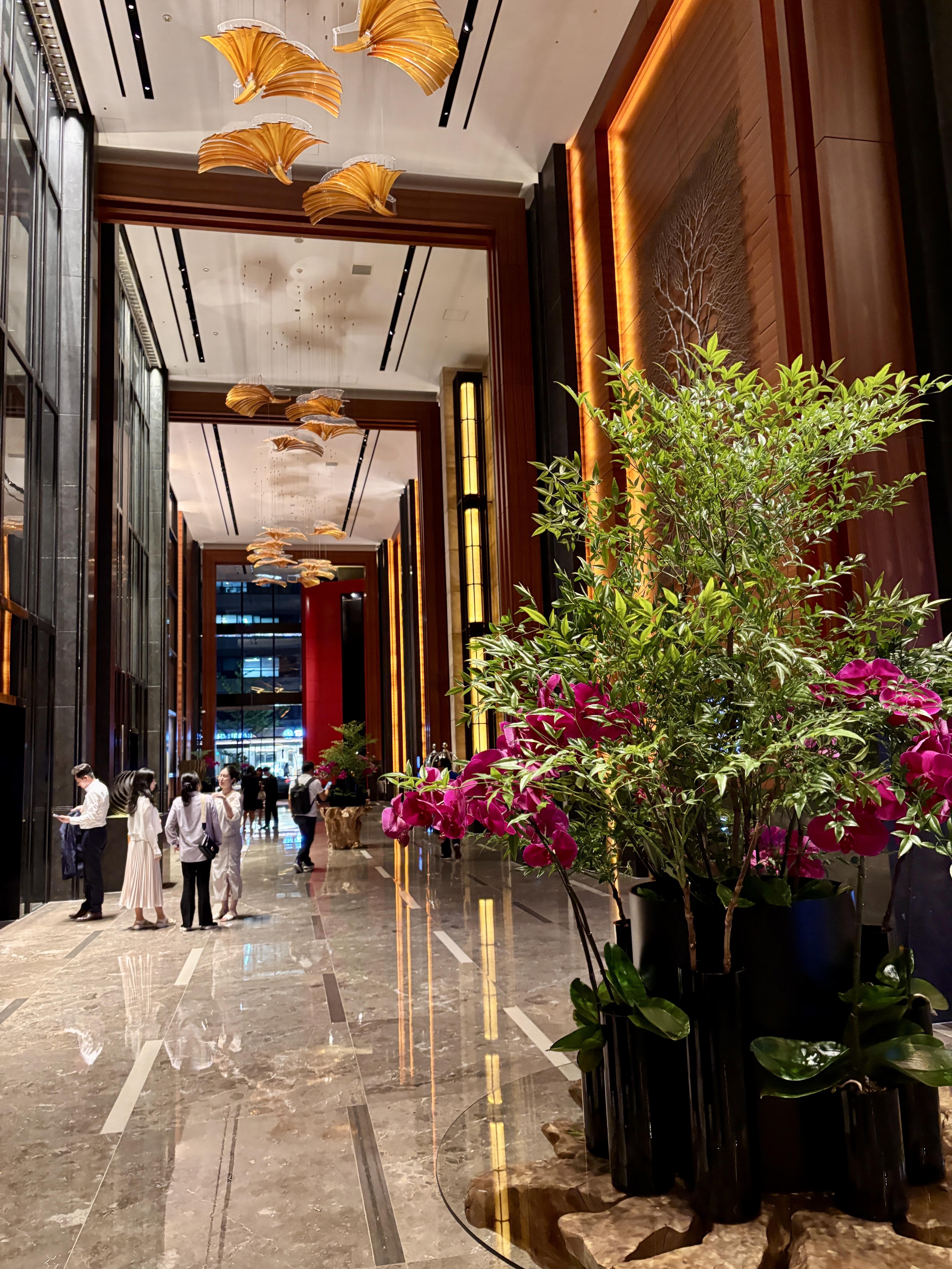 Main Hall of Conrad Hotel in Seoul, with orchids as the main focus