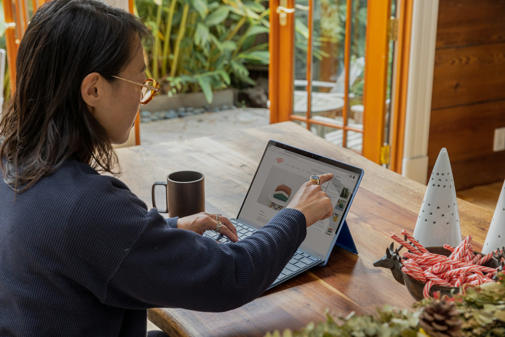 Woman looking at computer Korea Business